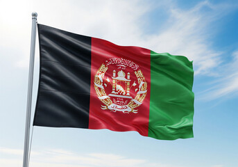 Waving Afghan flag against a bright blue sky with wispy clouds, symbolizing national pride and freedom.