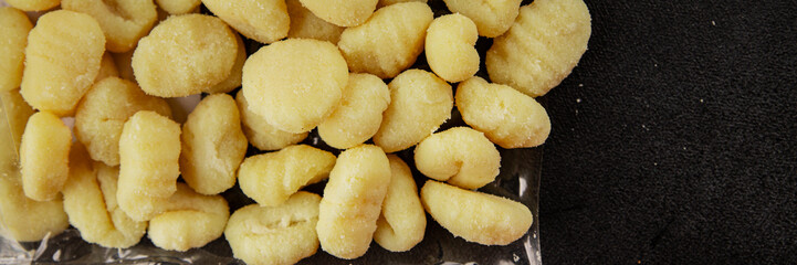 Gnocchi raw potato dough snack fresh delicious gourmet food background on the table  rustic food top view copy space vegetarian food