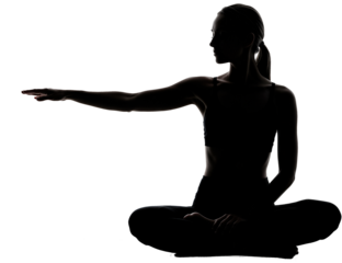 Silhouette of a woman sitting with outstretched hand, backlit