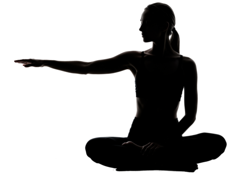 Silhouette of a woman sitting with outstretched hand, backlit