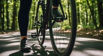 cyclist leg shoe bicycle forest road