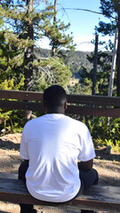 Person sitting outdoors scenic view