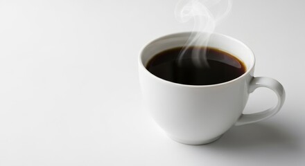 Obraz premium A white ceramic mug of fresh, dark coffee, steam rising gently against a clean, white background
