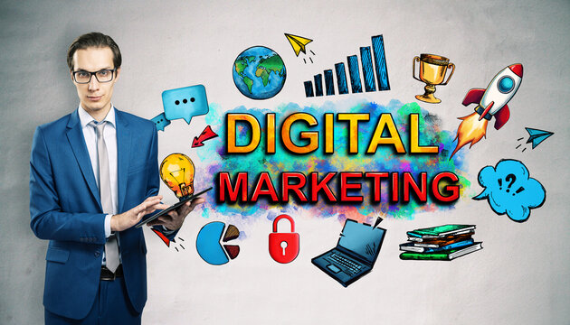 Businessperson using tablet with colorful digital marketing sketch and icons on concrete wall background in business technology concept. - Powered by Adobe