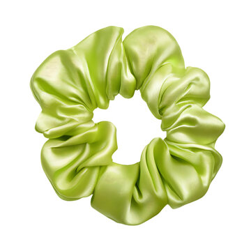 A light green silky scrunchie hair tie isolated 
