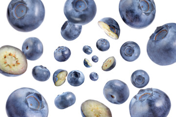 Fresh blueberries swirling in air against white background