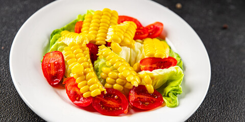 Corn salad tomato fresh vegetables snack fresh delicious gourmet food background on the table  rustic food top view copy space keto and paleo diet vegetarian and vegan food