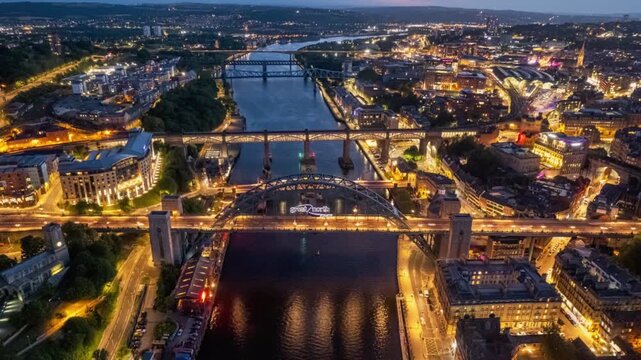 Aerial view of cardiff city skyline at night with the river taff and bridges