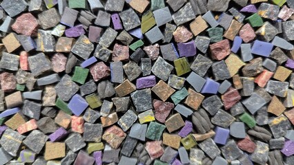 Colorful mosaic tiles arranged in a vibrant, patterned display