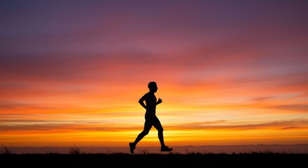 Fototapeta premium Silhouette Runner Against Sunset: The silhouette of a determined individual runs gracefully against the backdrop of a vibrant sunset, embodying fitness and perseverance.