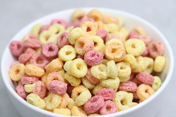 Breakfast cereal. Colorful crispy rings of dry. Children's breakfast. Healthy food.