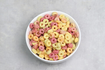 Breakfast cereal. Colorful crispy rings of dry. Children's breakfast. Healthy food.