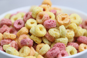 Breakfast cereal. Colorful crispy rings of dry. Children's breakfast. Healthy food.