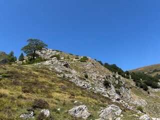 Mountain landscape with blue sky.