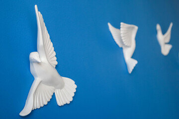 White Dove Wall Decoration on Blue Background