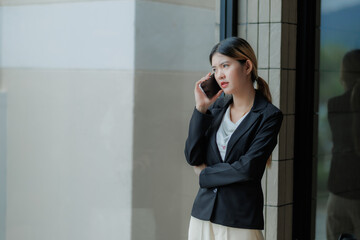 Fototapeta premium Determined female CEO working hard to boost sales and drive business growth.