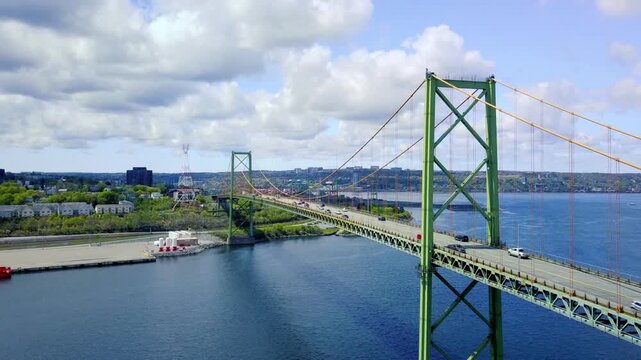 View of the halifax skyline and the angus l macdonald bridge on a sunny day
