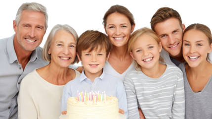 A joyful family celebrating a birthday with a cake, featuring a mix of ages and smiling faces.