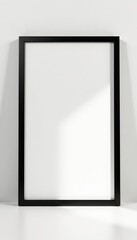Modern sleek black photo frame, bright white backdrop, glossy, empty, minimalist