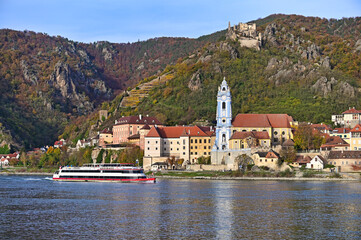 Panorama of Durnstein with ship on Danube river in Lower Austria, Austria,autumn season