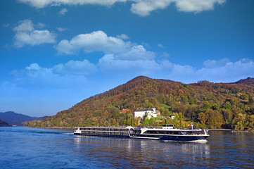 Panorama of Wachau valley (Unesco world heritage site) with ship on Danube river in Lower Austria, Austria,autumn season