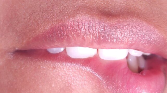 Close up Macro of Indian teenage girl lips doing various types of expressions.