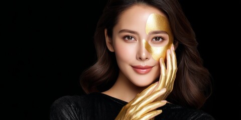 Naklejka premium Elegant Woman Applying Golden Skincare Product for Radiant Look Against Dark Background