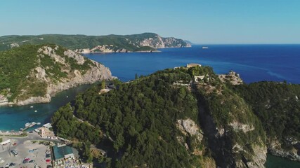 Picturesque landscape of corfu island with green hills and blue sea in greece