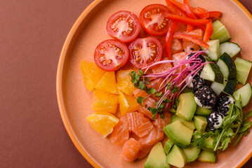 Bowl with salmon pieces, cheese, tomatoes, peppers and avocado. Salmon bowl