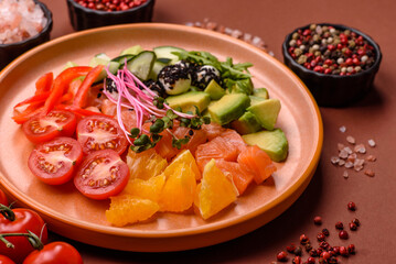 Bowl with salmon pieces, cheese, tomatoes, peppers and avocado. Salmon bowl