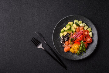 Bowl with salmon pieces, cheese, tomatoes, peppers and avocado. Salmon bowl