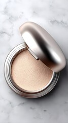 Sleek compact of pressed powder on marble surface