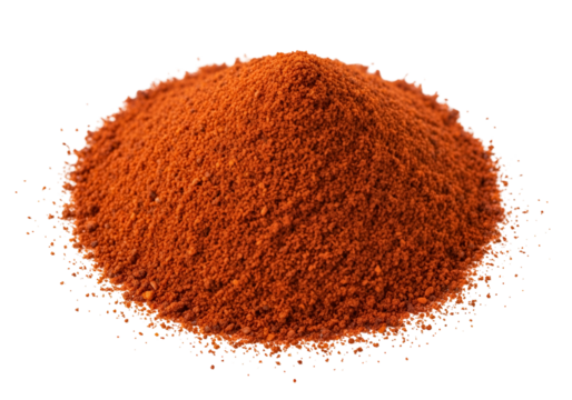 Vibrant orange spice powder in a conical mound isolated on black background