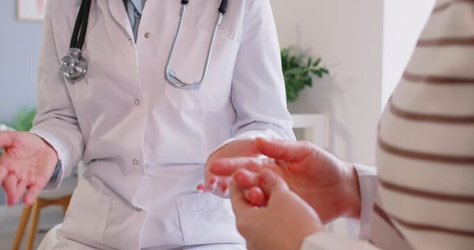 Doctor meeting consulting woman patient in healthcare clinic close up focusing on female health, offering medical advice, clinician lady talking to young middle aged wife, planning test, check, exam