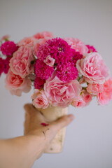 woman holding a bouquet of roses