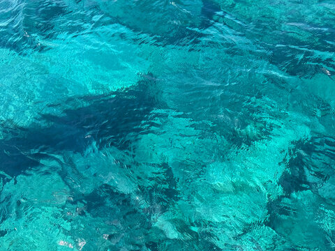 Sea deep blue azure water background.
