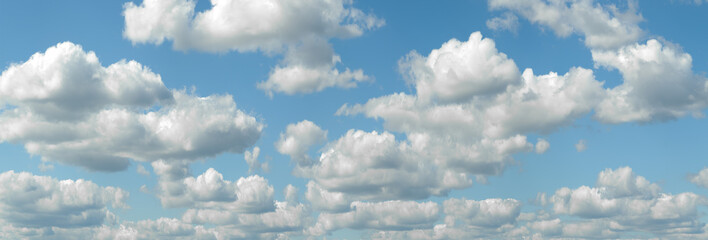 wide panorams of heaven sky is blue with many clouds. clouds are scattered throughout the sky and are of various sizes.