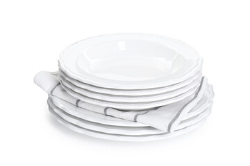 Stack of clean dishware and towel isolated on white