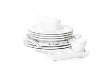 Set of different clean dishware and towel isolated on white