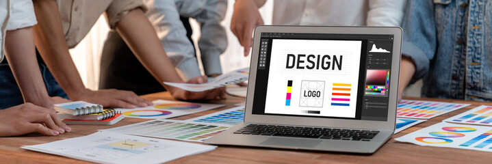 Graphic designer software for modern design of web page and commercial brisk ads showing on the...