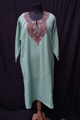 Kashmiri pheran displayed on a mannequin in Kashmir