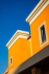 Obraz premium Colourful house in Lagos, Portugal with a blue sky