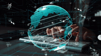 This image features a futuristic representation of earth combined with data charts over a keyboard, symbolizing advancements in technology and global business analytics. Xenic