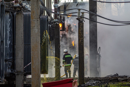 Firefighters extinguishing a blaze at an electrical substation