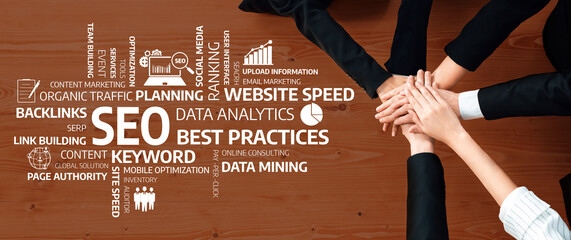 A dynamic scene of a diverse team collaborating over a table to enhance their SEO strategy with...