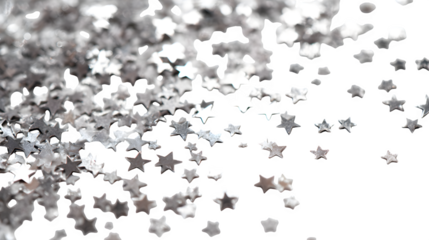 Sparkling silver star confetti scattered across a bright white background, creating a festive and celebratory atmosphere.