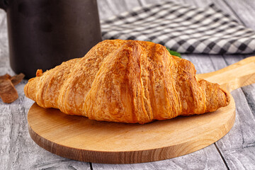 Fresh hot homemade croissant for breakfast
