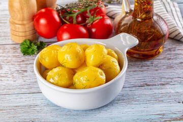 Boiled young potato with oil