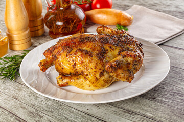 Baked in oven whole chicken with spices