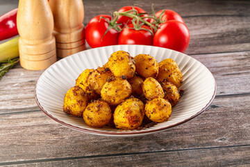 Baked small baby potato with herbs